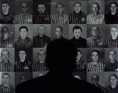 Photos of Auschwitz prisoners at the Imperial War Museum. According to a new book, German youths killed concentration camp survivors on 'death marches' which they referred to as 'zebra hunting', a reference to the striped uniforms worn by inmates