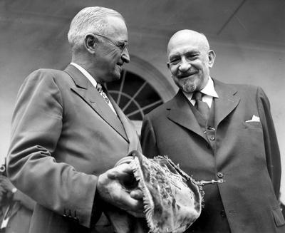 President Harry S. Truman and Israeli President Dr. Chaim Weizmann. Truman is holding a blue velvet mantle embellished with the Star of David. The mantle was a gift symbolizing Israel's gratitude for American recognition of and support for the new nation.
